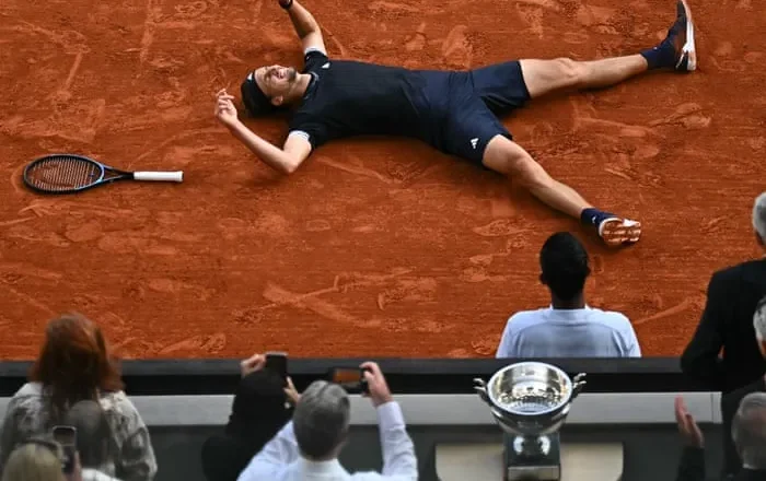 Alexander Zverev wins first grand slam after holding off Cobolli in French Open